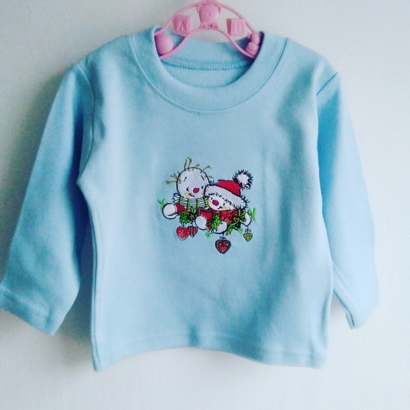 MACHINE EMBROIDERED PALE BLUE SNOWMAN CHRISTMAS TOP 0-3 MONTHS-MACHINE EMBROIDERED ,BABY BABYS, CHRISTMAS,TOP,CHEAP,SNOWMEN